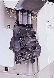Fully programmable three-axis CNC loader system